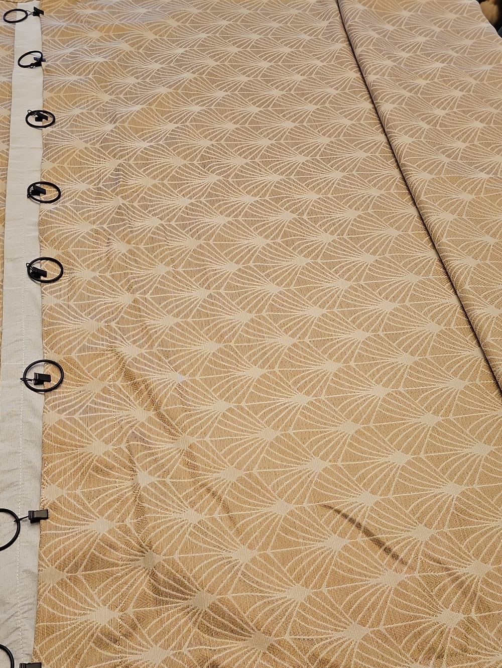 Four Beige/Tan Geometric Fan Blackout Curtain Panels with Ring Tabs